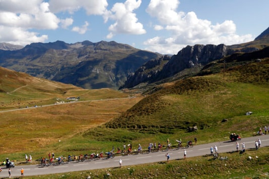 Riders in the breakeway climb Cormet de Roselend during the stage 18 of the Tour de France cycling race over 175 kilometers (108.7 miles) from Meribel to La Roche-sur-Foron, France, Thursday, Sept. 17, 2020. (AP Photo/Thibault Camus)