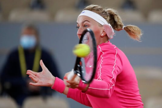 Petra Kvitova of the Czech Republic plays a shot against France's Oceane Dodin in the first round match of the French Open tennis tournament at the Roland Garros stadium in Paris, France, Monday, Sept. 28, 2020. (AP Photo/Alessandra Tarantino) Petra Kvitova of the Czech Republic plays a shot against France's Oceane Dodin in the first round match of the French Open tennis tournament at the Roland Garros stadium in Paris, France, Monday, Sept. 28, 2020. (AP Photo/Alessandra Tarantino)