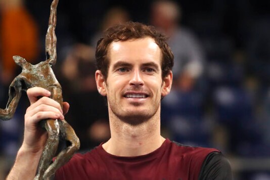 FILE - In this Sunday, Oct. 20, 2019, file photo, Andy Murray of Britain poses with the trophy after winning the European Open final tennis match in Antwerp, Belgium.Murray is ranked 111th heading into the French Open. (AP Photo/Francisco Seco, File)