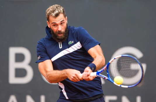 Benoit Paire of France returns during his 1st round tennis match at the ATP Tour - German Open in Hamburg, Germany, Wednesday, Sept. 23, 2020. (Daniel Bockwoldt/dpa via AP) Benoit Paire of France returns during his 1st round tennis match at the ATP Tour - German Open in Hamburg, Germany, Wednesday, Sept. 23, 2020. (Daniel Bockwoldt/dpa via AP)