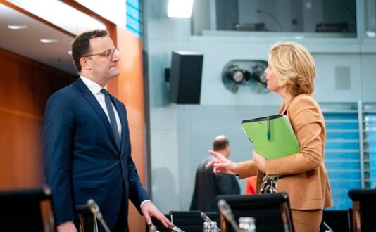 Jens Spahn, Federal Minister of Health, and Julia Kloeckner, Federal Minister of Food and Agriculture, take part in the meeting of the Federal Cabinet at the Federal Chancellery in Berlin, Germany, Wednesday, Sept. 23, 2020. (Kay Nietfeld/dpa via AP)