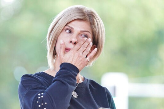 Tima Kurdi, aunt of the refugee boy Alan Kurdi who drowned in 2015, speaks and cries at an alliance demonstration for the immediate evacuation of all Greek camps in Berlin, Germany, Sunday. Sept.20, 2020.  The alliance of Pro Asyl, the Berlin pier and other groups is calling on the German government to stop blocking the reception of refugees by local and state governments. (Joerg Carstensen/dpa via AP)