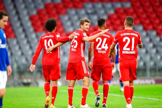 Bayern's Thomas Mueller celebrates with teammates a goal during the German Bundesliga soccer match between FC Bayern Munich and Schalke 04 in Munich, Germany, Friday, Sept. 18, 2020. (AP Photo/Matthias Schrader) Bayern's Thomas Mueller celebrates with teammates a goal during the German Bundesliga soccer match between FC Bayern Munich and Schalke 04 in Munich, Germany, Friday, Sept. 18, 2020. (AP Photo/Matthias Schrader)