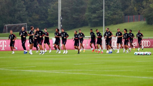 Bayern Munich players warm up for a training session in Munich, Germany, Friday, Sept. 11, 2020. The German Bundesliga starts next Friday, Sept. 18, 2020. (AP Photo/Matthias Schrader)