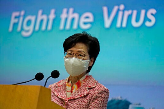 Hong Kong Chief Executive Carrie Lam listens to a reporter's questions during a press conference in Hong Kong, Tuesday, Sept. 22, 2020. Lam said the semi-autonomous Chinese territory has seen its image damaged in the international arena following Chinas imposition in June of a sweeping national security law demanding total loyalty to Chinas ruling Communist Party. Lam declined to comment directly to reporters on the reasons behind the resignation of an Australian judge on Hong Kongs top court that has raised the questions about the future of judicial independence in the territory. (AP Photo/Vincent Yu) Hong Kong Chief Executive Carrie Lam listens to a reporter's questions during a press conference in Hong Kong, Tuesday, Sept. 22, 2020. Lam said the semi-autonomous Chinese territory has seen its image damaged in the international arena following Chinas imposition in June of a sweeping national security law demanding total loyalty to Chinas ruling Communist Party. Lam declined to comment directly to reporters on the reasons behind the resignation of an Australian judge on Hong Kongs top court that has raised the questions about the future of judicial independence in the territory. (AP Photo/Vincent Yu)