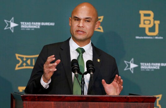 FILE - In this Jan. 20, 2020 file photo, Baylor's new head football coach Dave Aranda addresses the media during an NCAA college football news conference in Waco, Texas.   Aranda will make his delayed debut as Baylor's coach in a quickly arranged and unexpected reunion of old Southwest Conference rivals. Baylor and Houston open this pandemic-altered season Saturday, Sept. 19,  with their first meeting since the SWCs final season in 1995.  (Jerry Larson/Waco Tribune-Herald via AP, File)