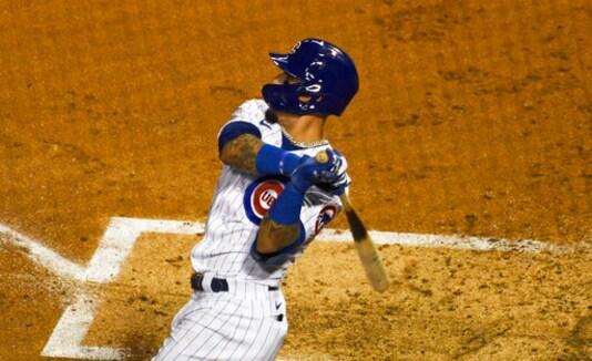 Chicago Cubs' Javier Baez (9) hits a home run against the Cleveland Indians during the second inning of a baseball game, Tuesday, Sept.15, 2020, in Chicago. (AP Photo/David Banks)