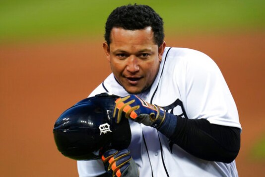 Detroit Tigers' Miguel Cabrera gestures with his helmet against the Cleveland Indians in the first inning of a baseball game in Detroit, Friday, Sept. 18, 2020. (AP Photo/Paul Sancya)