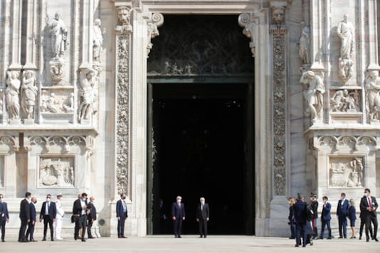 German President Frank-Walter Steinmeier, is flanked by Italian President Sergio Mattarella after visiting the Duomo gothic cathedral, in Milan, Italy, Thursday, Sept. 17, 2020. Steinmeier is scheduled to meet doctors, medical staff and former patients to discuss the coronavirus pandemic and Germany's support to Italy during his two-day visit. (AP Photo/Luca Bruno) German President Frank-Walter Steinmeier, is flanked by Italian President Sergio Mattarella after visiting the Duomo gothic cathedral, in Milan, Italy, Thursday, Sept. 17, 2020. Steinmeier is scheduled to meet doctors, medical staff and former patients to discuss the coronavirus pandemic and Germany's support to Italy during his two-day visit. (AP Photo/Luca Bruno)