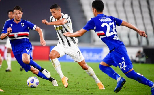 Sampdoria's Albin Ekdal, left, Juventus' Cristiano Ronaldo, center, and Sampdoria's Maya Yoshida, right, compete for the ball during an Italian Serie A soccer match between Juventus and Sampdoria at the Allianz stadium in Turin, Italy, Sunday, Sept. 20, 2020. (Marco Alpozzi/LaPresse via AP)
