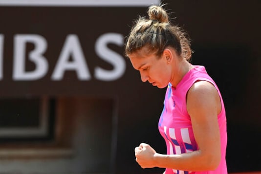 Simona Halep reacts during the quarterfinal match against Yulia Putintseva at the Italian Open tennis tournament, in Rome, Saturday, Sept. 19, 2020. (Alfredo Falcone/LaPresse via AP) Simona Halep reacts during the quarterfinal match against Yulia Putintseva at the Italian Open tennis tournament, in Rome, Saturday, Sept. 19, 2020. (Alfredo Falcone/LaPresse via AP)