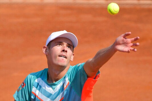 Australia's Alex De Minaur serves a ball to Germany's Dominik Koepfer during their match at the Italian Open tennis tournament in Rome, Tuesday, Sept. 15, 2020.  (Alfredo Falcone/LaPresse via AP)