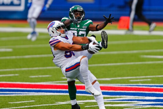 Buffalo Bills outside linebacker Matt Milano (58) intercepts a pass intended for New York Jets wide receiver Jamison Crowder (82) during the first half of an NFL football game in Orchard Park, N.Y., Sunday, Sept. 13, 2020. (AP Photo/Jeffrey T. Barnes)