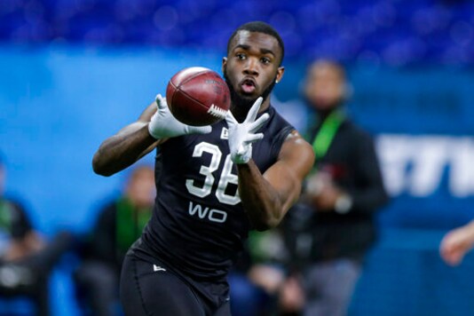 FILE - In this Thursday, Feb. 27, 2020 file photo, Baylor wide receiver Denzel Mims runs a drill at the NFL football scouting combine in Indianapolis. The New York Jets are getting healthy again at just the right time. Wide receivers Breshad Perriman and Denzel Mims practiced fully Wednesday, Sept. 9, 2020 and are expected to be healthy for the season opener against the Bills in Buffalo on Sunday. (AP Photo/Michael Conroy, File)