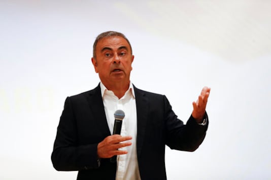 Nissan's former executive Carlos Ghosn speaks during a press conference at the Holy Spirit University of Kaslik (USEK), north of Beirut, Lebanon, Tuesday, Sept. 29, 2020. Ghosn was arrested in Japan in 2018, and was awaiting trial on charges of under-reporting future income and breach of trust when he jumped bail and escaped to Lebanon late last year. The Brazilian-born Frenchman has Lebanese citizenship. (AP Photo/Hussein Malla)