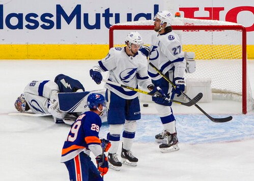 Tampa Bay Lightning goalie Andrei Vasilevskiy (88) and teammates Anthony Cirelli (71) and Ryan McDonagh (27) react after a New York Islanders goal, as Islanders' Brock Nelson (29) skates past during the second period of Game 3 of the NHL hockey Eastern Conference final, Friday, Sept. 11, 2020, in Edmonton, Alberta. (Jason Franson/The Canadian Press via AP)