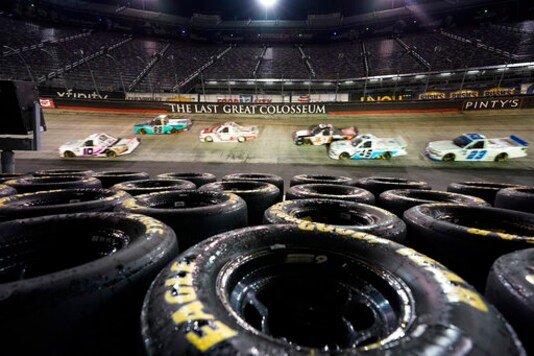 The field passes through Turn 2 during the NASCAR Truck Series auto race Thursday, Sept. 17, 2020, in Bristol, Tenn. (AP Photo/Steve Helber)