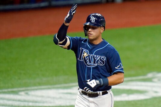 Tampa Bay Rays' Nate Lowe celebrates his solo home run off Washington Nationals starting pitcher Anibal Sanchez during the second inning of a baseball game Tuesday, Sept. 15, 2020, in St. Petersburg, Fla. (AP Photo/Chris O'Meara)