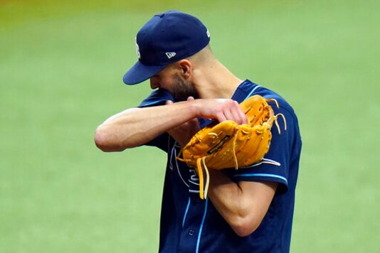 Tampa Bay Rays relief pitcher Nick Anderson (70) reacts after giving up a two-run home run to Washington Nationals' Luis Garcia during the 10th inning of a baseball game Wednesday, Sept. 16, 2020, in St. Petersburg, Fla. (AP Photo/Chris O'Meara)