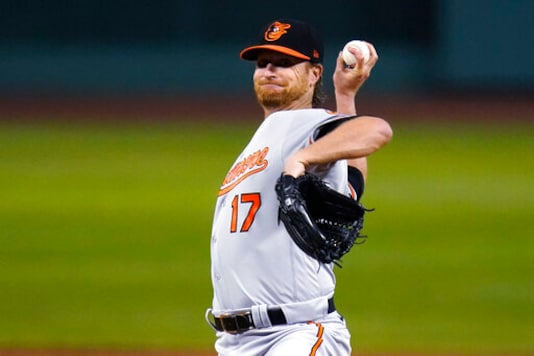 Baltimore Orioles starting pitcher Alex Cobb winds up during the first inning of the team's baseball game against the Boston Red Sox at Fenway Park in Boston, Thursday, Sept. 24, 2020. (AP Photo/Charles Krupa) Baltimore Orioles starting pitcher Alex Cobb winds up during the first inning of the team's baseball game against the Boston Red Sox at Fenway Park in Boston, Thursday, Sept. 24, 2020. (AP Photo/Charles Krupa)