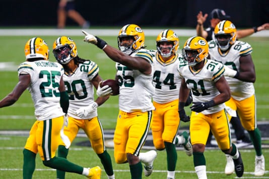 Green Bay Packers outside linebacker Za'Darius Smith (55)c elaborates his fumble recovery in the second half of an NFL football game against the New Orleans Saints in New Orleans, Sunday, Sept. 27, 2020. (AP Photo/Brett Duke) Green Bay Packers outside linebacker Za'Darius Smith (55)c elaborates his fumble recovery in the second half of an NFL football game against the New Orleans Saints in New Orleans, Sunday, Sept. 27, 2020. (AP Photo/Brett Duke)