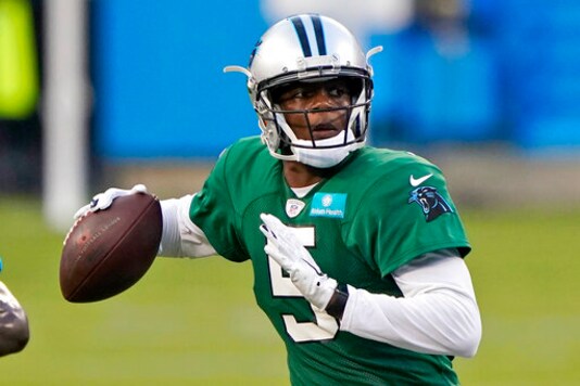 FILE - In this Aug. 26, 2020, file photo, Carolina Panthers quarterback Teddy Bridgewater throws a pass during NFL football practice in Charlotte, N.C. Four years ago the quarterback suffered a torn ACL and fractured kneecap which left his budding NFL career in serious doubt. (AP Photo/Chris Carlson, File)