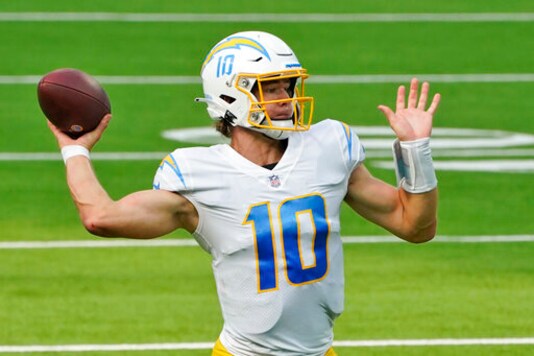 Los Angeles Chargers quarterback Justin Herbert throws against the Carolina Panthers during the second half of an NFL football game Sunday, Sept. 27, 2020, in Inglewood, Calif. (AP Photo/Ashley Landis)