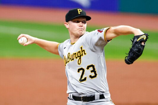 Pittsburgh Pirates starting pitcher Mitch Keller delivers against the Cleveland Indians during the first inning of a baseball game, Friday, Sept. 25, 2020, in Cleveland. (AP Photo/Ron Schwane)