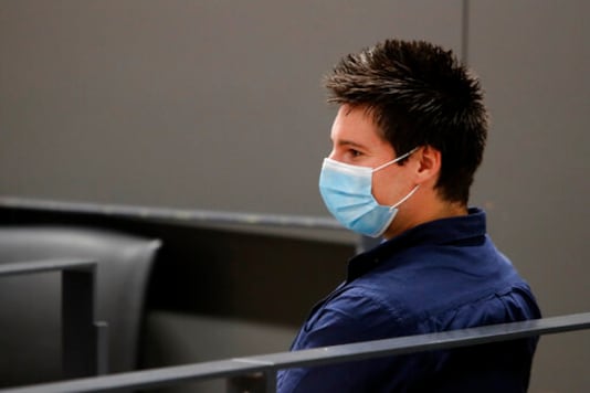 Portuguese hacker Rui Pinto sits in the courtroom at the start of his trial in Lisbon, Friday, Sept. 4, 2020. Lisbon court is hearing the case against 31-year-old Pinto, whose explose was published over financial revelations about European soccer players, top clubs, influential agents and continental officials. (AP Photo/Armando Franca) Portuguese hacker Rui Pinto sits in the courtroom at the start of his trial in Lisbon, Friday, Sept. 4, 2020. Lisbon court is hearing the case against 31-year-old Pinto, whose explose was published over financial revelations about European soccer players, top clubs, influential agents and continental officials. (AP Photo/Armando Franca)