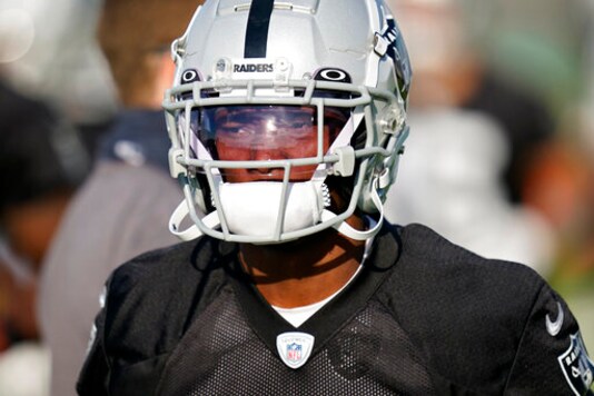 FILE - Las Vegas Raiders wide receiver Henry Ruggs III attends an NFL football training camp practice Thursday, Aug. 13, 2020, in Henderson, Nev. The Raiders play the Carolina Panthers on Sunday, Sept. 13. (AP Photo/John Locher, Pool, File)
