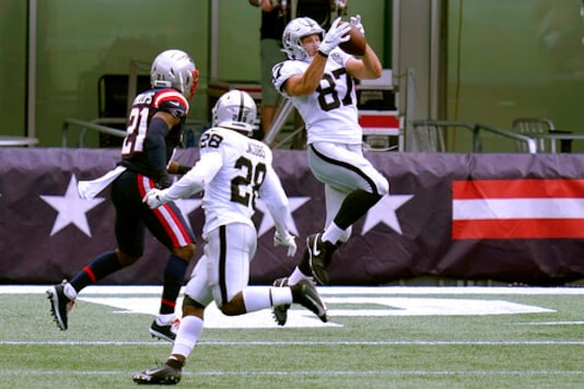 Las Vegas Raiders tight end Foster Moreau (87) catches a pass for a touchdown in the first half of an NFL football game against the New England Patriots, Sunday, Sept. 27, 2020, in Foxborough, Mass. (AP Photo/Charles Krupa) Las Vegas Raiders tight end Foster Moreau (87) catches a pass for a touchdown in the first half of an NFL football game against the New England Patriots, Sunday, Sept. 27, 2020, in Foxborough, Mass. (AP Photo/Charles Krupa)