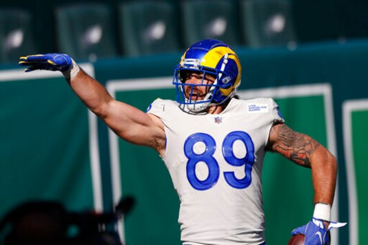Los Angeles Rams' Tyler Higbee celebrates after catching a touchdown pass during the second half of an NFL football game against the Philadelphia Eagles, Sunday, Sept. 20, 2020, in Philadelphia. (AP Photo/Laurence Kesterson)
