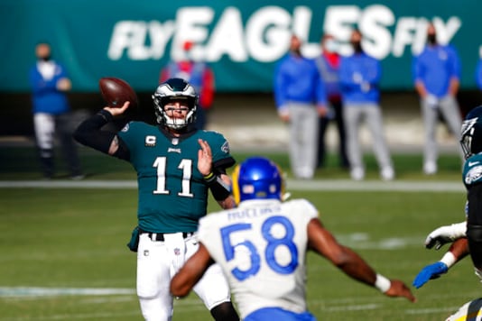 Philadelphia Eagles' Carson Wentz plays during the second half of an NFL football game against the Los Angeles Rams, Sunday, Sept. 20, 2020, in Philadelphia. (AP Photo/Laurence Kesterson) Philadelphia Eagles' Carson Wentz plays during the second half of an NFL football game against the Los Angeles Rams, Sunday, Sept. 20, 2020, in Philadelphia. (AP Photo/Laurence Kesterson)
