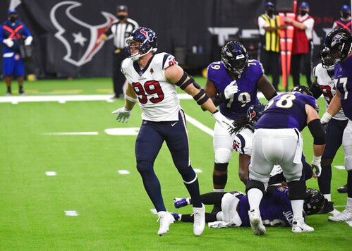 Houston Texans defensive end J.J. Watt (99) celebrates after sacking Baltimore Ravens quarterback Lamar Jackson during the first half of an NFL football game Sunday, Sept. 20, 2020, in Houston. (AP Photo/Eric Christian Smith) Houston Texans defensive end J.J. Watt (99) celebrates after sacking Baltimore Ravens quarterback Lamar Jackson during the first half of an NFL football game Sunday, Sept. 20, 2020, in Houston. (AP Photo/Eric Christian Smith)