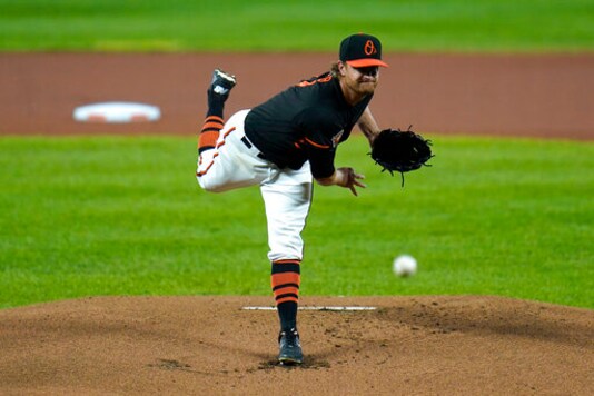 Baltimore Orioles pitcher Alex Cobb throws a pitch to the Tampa Bay Rays during the first inning of a baseball game, Friday, Sept. 18, 2020, in Baltimore. (AP Photo/Julio Cortez)