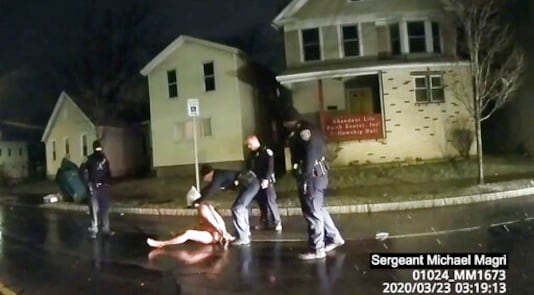 FILE - In this image taken from police body camera video provided by Roth and Roth LLP on Sept. 2, 2020, a Rochester police officer puts a hood over the head of Daniel Prude, on March 23, 2020, in Rochester, N.Y. On Tuesday, Sept. 8, 2020, Rochester Mayor Lovely Warren announced that top police leaders in the city are retiring en masse amid criticism of the city's handling of Prude's death. (Rochester Police via Roth and Roth LLP via AP)