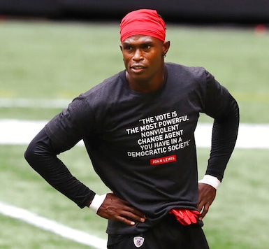 Atlanta Falcons wide receiver Julio Jones wears a shirt in honor of John Lewis while preparing to play the Seattle Seahawks in am NFL football game on Sunday, Sept. 13, 2020, in Atlanta. (Curtis Compton/Atlanta Journal-Constitution via AP) Atlanta Falcons wide receiver Julio Jones wears a shirt in honor of John Lewis while preparing to play the Seattle Seahawks in am NFL football game on Sunday, Sept. 13, 2020, in Atlanta. (Curtis Compton/Atlanta Journal-Constitution via AP)