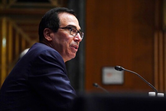 Treasury Secretary Steve Mnuchin testifies during the Senate's Committee on Banking, Housing, and Urban Affairs hearing examining the quarterly CARES Act report to Congress on Capitol Hill, Wednesday, Sept. 24, 2020, in Washington. (Toni L. Sandys/The Washington Post via AP, Pool)