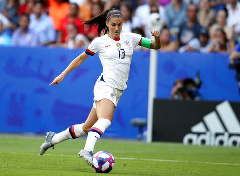 FILE - In this July 7, 2019, file photo, United States' Alex Morgan controls the ball during the Women's World Cup final soccer match against The Netherlands at the Stade de Lyon in Decines, outside Lyon, France. Tottenham secured the biggest signing yet in a summer of high-profile acquisitions in the Womens Super League by bringing in United States striker Alex Morgan on a one-season deal. The 31-year-old Morgan will play in England for the first time and moves four months after giving birth to her first child. (AP Photo/David Vincent, File)