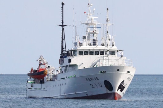 A South Korea's government ship for a fishery guidance, is seen near Yeonpyeong island, South Korea, Thursday, Sept. 24, 2020. According to Seoul, a man disappeared from the government ship that was checking on potential unauthorized fishing in an area south of the boundary on Monday, a day before he was found in North Korean waters. (Choi Jin-suk/Newsis via AP)