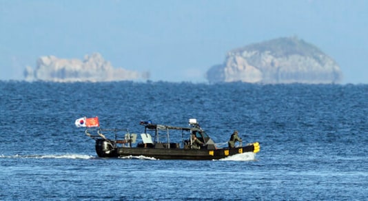 A South Korean marine boat patrols near Yeonpyeong island, South Korea, Sunday, Sept. 27, 2020. North Korea accused South Korea of sending ships across the disputed sea boundary to find the body of a man recently killed by North Korean troops, warning Sunday the alleged intrusion could escalate tensions. (Baek Seung-ryul/Yonhap via AP)
