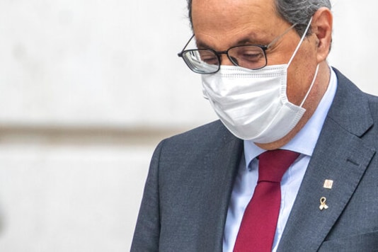 Catalan regional President Quim Torra arrives at the Spanish Supreme Court in Madrid, Spain, Thursday, Sept. 17, 2020. Spain's Supreme Court is hearing closing arguments over whether to uphold or overturn the barring from public office of Catalonia's separatist-minded regional leader. (AP Photo/Manu Fernandez)