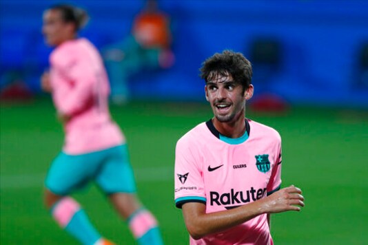 Barcelona's Francisco Trincao, gestures during the pre-season friendly soccer match between Barcelona and Girona at the Johan Cruyff Stadium in Barcelona, Spain, Wednesday, Sept. 16, 2020. (AP Photo/Joan Monfort)