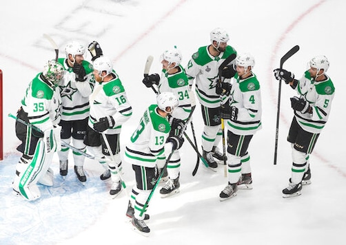 The Dallas Stars celebrate their win over the Tampa Bay Lightning in NHL Stanley Cup finals hockey action in Edmonton, Alberta, Saturday, Sept. 19, 2020. (Jason Franson/The Canadian Press via AP) The Dallas Stars celebrate their win over the Tampa Bay Lightning in NHL Stanley Cup finals hockey action in Edmonton, Alberta, Saturday, Sept. 19, 2020. (Jason Franson/The Canadian Press via AP)
