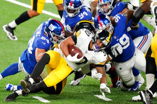 Pittsburgh Steelers running back James Conner (30) is tackled by the New York Giants during the first quarter of an NFL football game Monday, Sept. 14, 2020, in East Rutherford, N.J. (AP Photo/Frank Franklin II) Pittsburgh Steelers running back James Conner (30) is tackled by the New York Giants during the first quarter of an NFL football game Monday, Sept. 14, 2020, in East Rutherford, N.J. (AP Photo/Frank Franklin II)