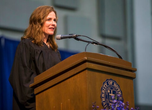 FILE - In this May 19, 2018, file photo, Amy Coney Barrett, United States Court of Appeals for the Seventh Circuit judge, speaks during the University of Notre Dame's Law School commencement ceremony at the university, in South Bend, Ind. Barrett, a front-runner to fill the Supreme Court seat vacated by the death of Justice Ruth Bader Ginsburg, has established herself as a reliable conservative on hot-button legal issues from abortion to gun control. (Robert Franklin/South Bend Tribune via AP, File) FILE - In this May 19, 2018, file photo, Amy Coney Barrett, United States Court of Appeals for the Seventh Circuit judge, speaks during the University of Notre Dame's Law School commencement ceremony at the university, in South Bend, Ind. Barrett, a front-runner to fill the Supreme Court seat vacated by the death of Justice Ruth Bader Ginsburg, has established herself as a reliable conservative on hot-button legal issues from abortion to gun control. (Robert Franklin/South Bend Tribune via AP, File)