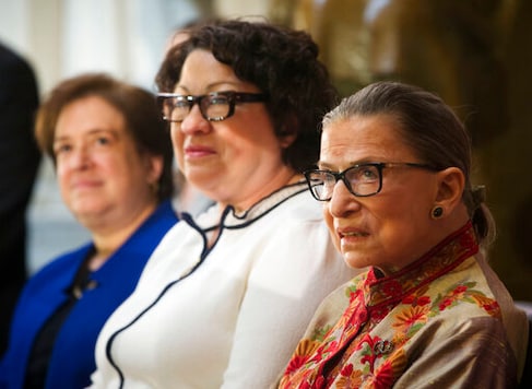 From left to right, U.S. Supreme Court, Associate Justices, Elena Kagan, Sonia Sotomayor, and Ruth Bader Ginsburg, on stage during a Women's History Month reception at Statuary Hall on Capitol Hill, hosted by Democratic Leader Rep. Nancy Pelosi, D-Calif., Wednesday, March 18, 2015, in Washington. Ruth Bader Ginsburg died at her home in Washington, on Sept. 18, 2020, the Supreme Court announced. (AP Photo/Pablo Martinez Monsivais)