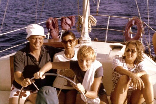 In this image provided by the Supreme Court, Ruth Bader Ginsburg, her husband Martin Ginsburg, and their children Jane and James off the coast of St. Thomas in 1979. (Collection of the Supreme Court of the United States via AP)