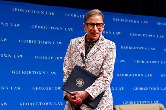 FILE - In this Sept. 26, 2018, file photo, Supreme Court Justice Ruth Bader Ginsburg leaves the stage after speaking to first-year students at Georgetown Law in Washington. The Supreme Court says Ginsburg has died of metastatic pancreatic cancer at age 87. (AP Photo/Jacquelyn Martin, File) FILE - In this Sept. 26, 2018, file photo, Supreme Court Justice Ruth Bader Ginsburg leaves the stage after speaking to first-year students at Georgetown Law in Washington. The Supreme Court says Ginsburg has died of metastatic pancreatic cancer at age 87. (AP Photo/Jacquelyn Martin, File)