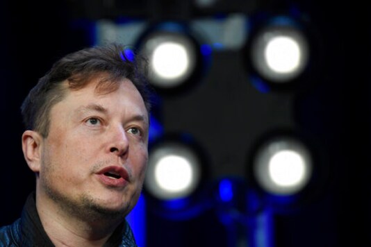 FILE - In this March 9, 2020, file photo, Tesla and SpaceX Chief Executive Officer Elon Musk speaks at the SATELLITE Conference and Exhibition in Washington. Tesla is expected to announce a breakthrough in electric vehicle battery chemistry on Tuesday Sept. 22 that could bring down the cost of the vehicles and increase their range and durability. At an event called battery day,  Musk likely will show off the new technology, which could increase the traveling range per charge and durability of its batteries.(AP Photo/Susan Walsh, File)